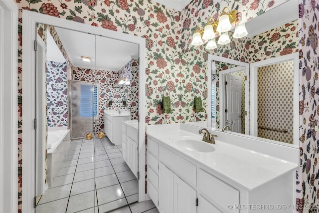 full bathroom featuring wallpapered walls, two vanities, tile patterned floors, a notable chandelier, and a sink