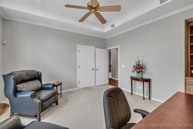 office featuring light carpet, visible vents, baseboards, and a ceiling fan