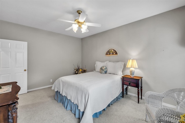 bedroom featuring carpet flooring, a ceiling fan, and baseboards