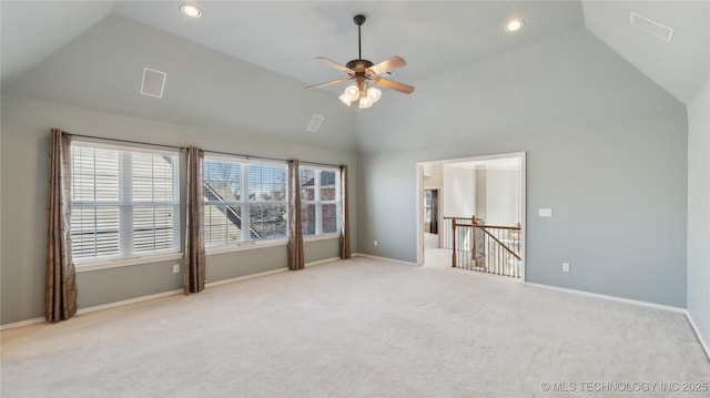 spare room featuring a ceiling fan, recessed lighting, carpet floors, baseboards, and vaulted ceiling