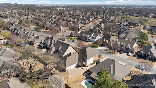 birds eye view of property with a residential view