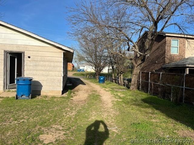 view of yard with fence