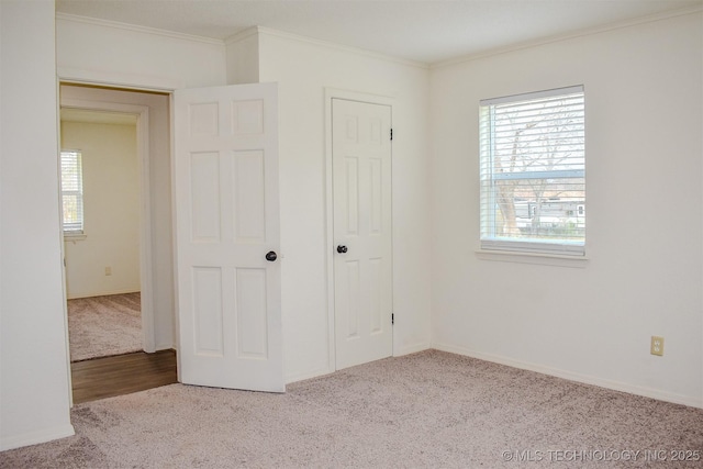 415347 E 1912th Rd, Antlers, OK 74523 - unfurnished bedroom with ornamental molding, baseboards, multiple windows, and carpet floors