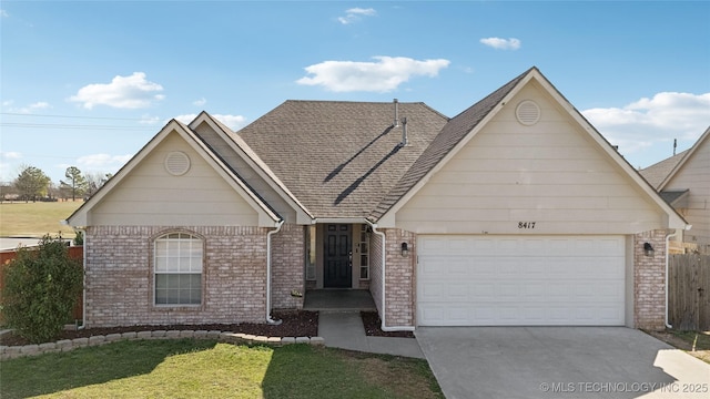 view of front of property featuring brick siding, driveway, and a shingled roof