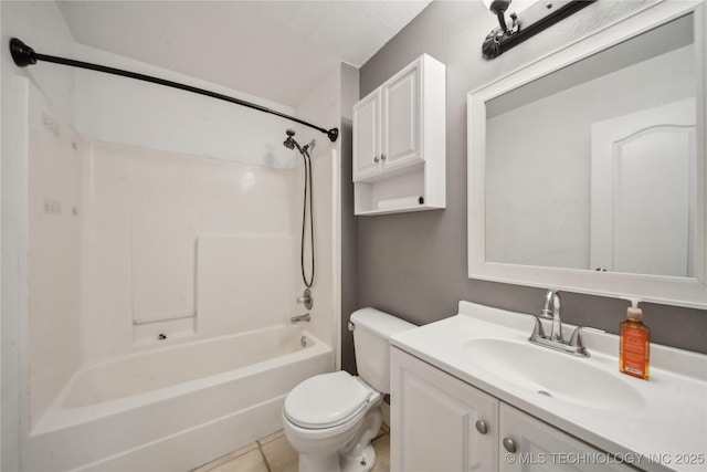 bathroom featuring vanity, tile patterned floors, toilet, and shower / bathtub combination