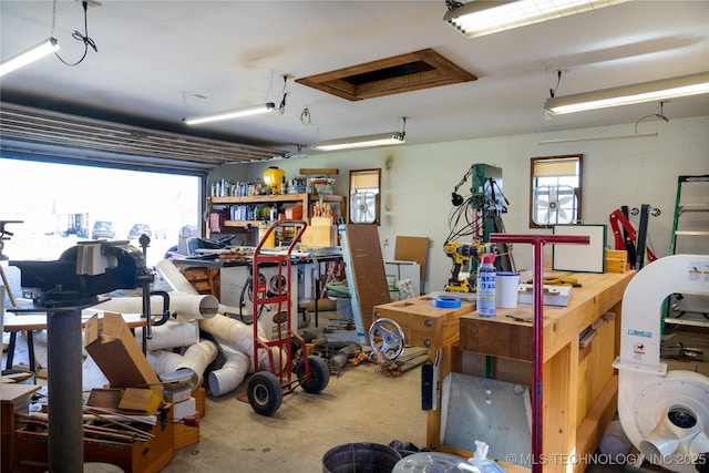 garage with a workshop area