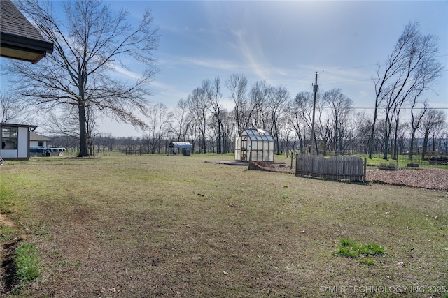 view of yard with an exterior structure and an outdoor structure