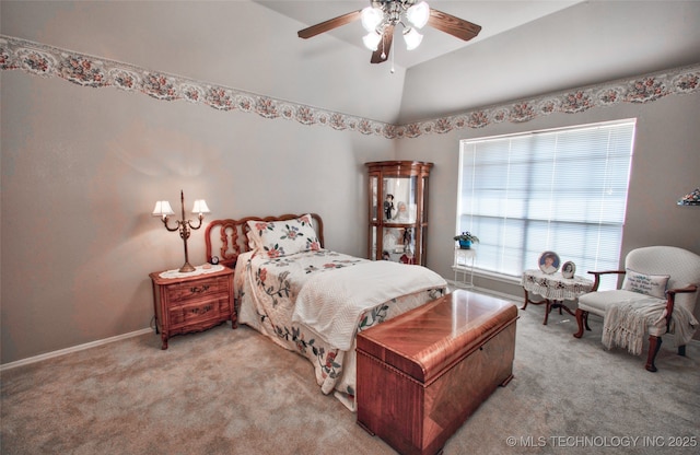 bedroom featuring light carpet, ceiling fan, and lofted ceiling