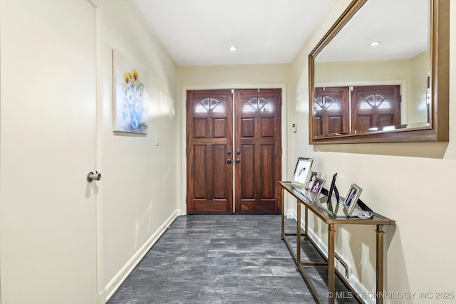 foyer entrance with recessed lighting, baseboards, and dark wood-style flooring