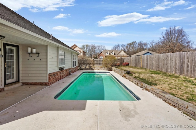 view of pool featuring a patio area, a fenced in pool, and a fenced backyard