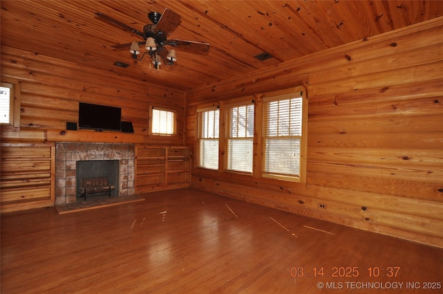 unfurnished living room with wood ceiling, ceiling fan, and wood finished floors