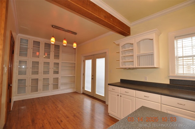 kitchen with dark countertops, french doors, wood finished floors, and open shelves