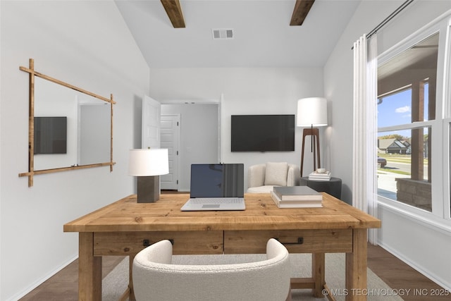 office area featuring visible vents, vaulted ceiling with beams, baseboards, and wood finished floors