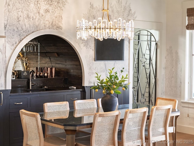 26 Boardwalk, Carlton Landing, OK 74432 - dining room with a chandelier and wood finished floors