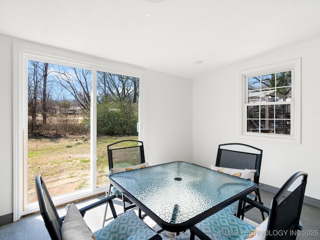 dining space with baseboards