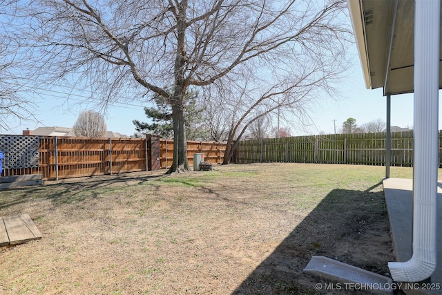 view of yard featuring a fenced backyard