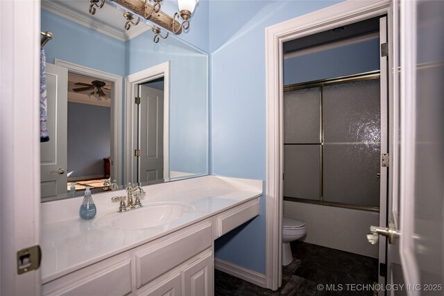 full bath with combined bath / shower with glass door, a ceiling fan, toilet, and vanity