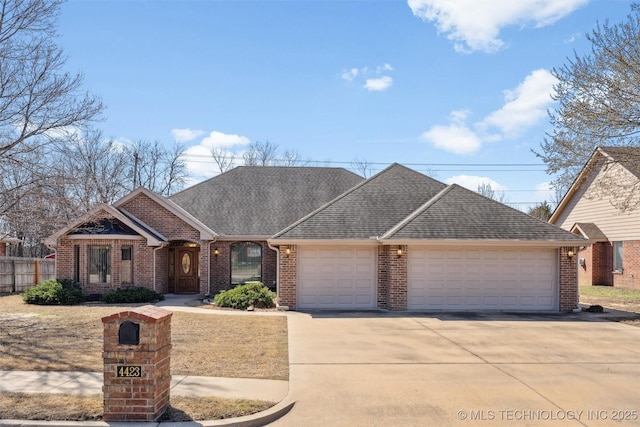 view of front of home with an attached garage, brick siding, driveway, and a shingled roof