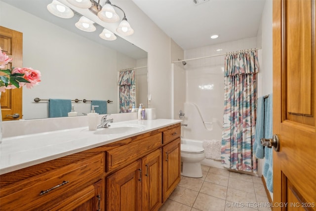 full bathroom with vanity, visible vents, shower / bath combo, tile patterned floors, and toilet