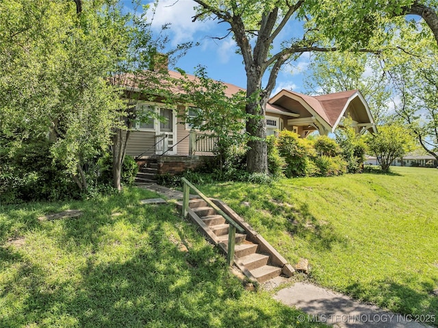 view of front of house with a front lawn