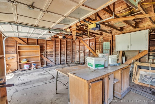 miscellaneous room with unfinished concrete flooring