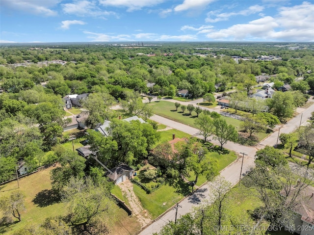 bird's eye view with a forest view