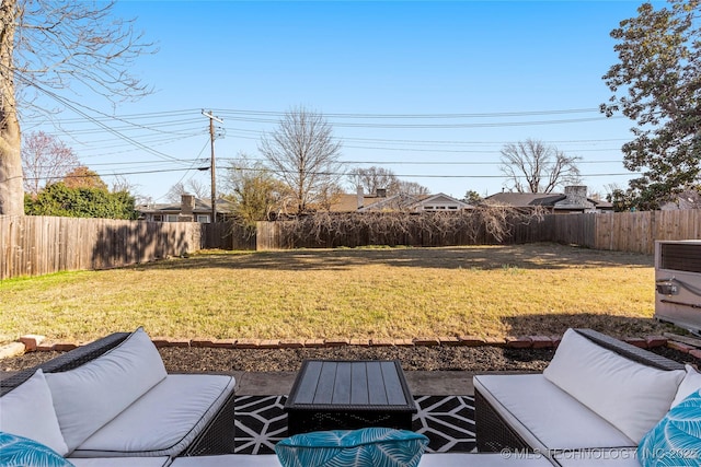 view of yard featuring a fenced backyard