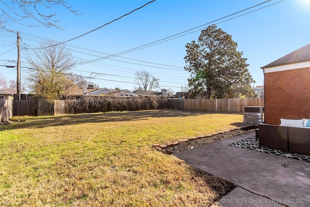 view of yard featuring cooling unit, a fenced backyard, and a patio area