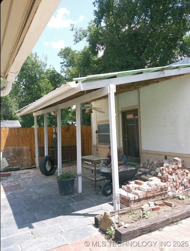 view of patio with fence