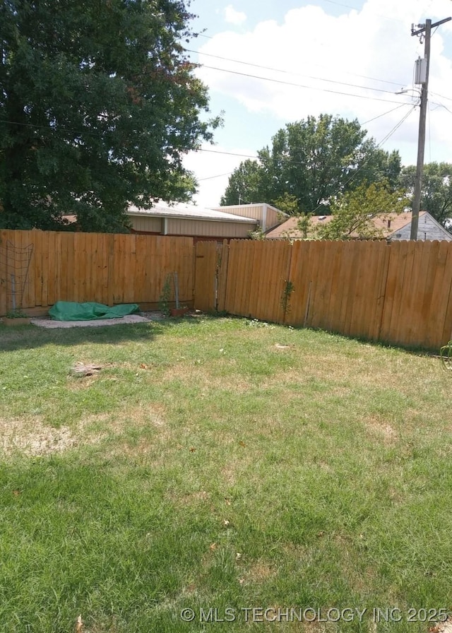 view of yard with fence