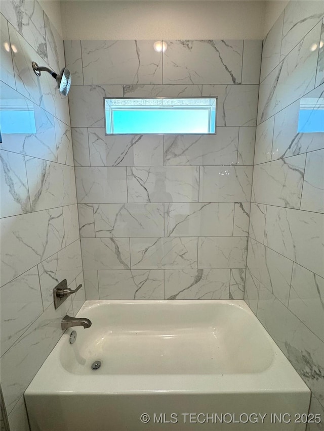 bathroom with shower / bath combination