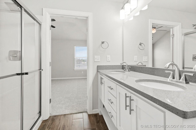 408 S 48th Ct S, Broken Arrow, OK 74014 - bathroom featuring a shower stall, wood finished floors, ceiling fan, and a sink