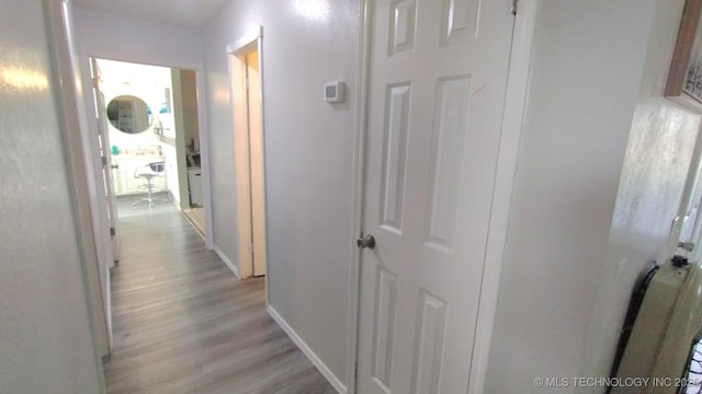 hall featuring light wood-style floors