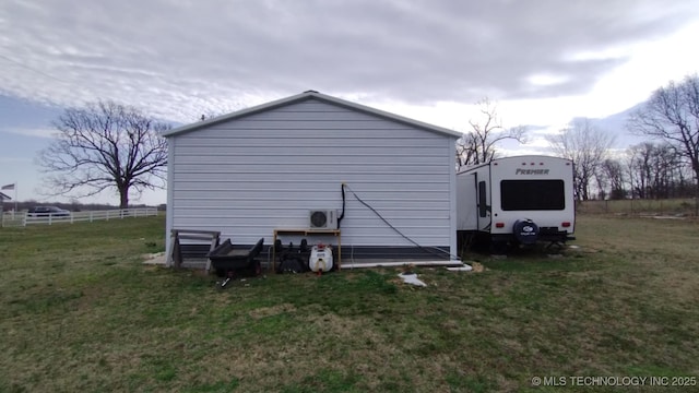 view of property exterior featuring ac unit and a lawn