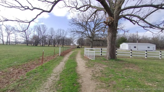 view of street featuring a rural view and driveway