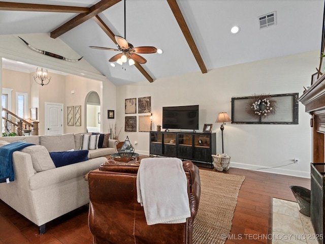 living area featuring visible vents, ceiling fan, beamed ceiling, arched walkways, and dark wood-style flooring