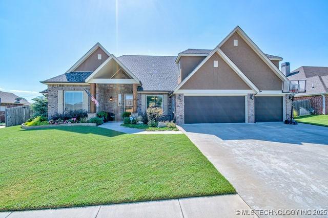 craftsman-style home featuring a front yard, fence, stucco siding, concrete driveway, and a garage