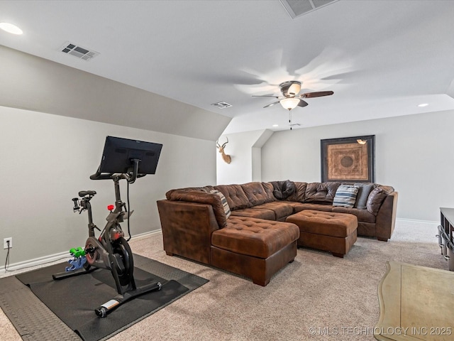 living area featuring visible vents, carpet floors, and ceiling fan