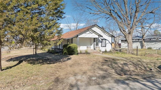 view of front of home with fence