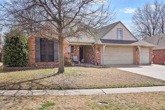 traditional-style home featuring brick siding, a front yard, roof with shingles, driveway, and an attached garage