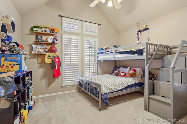 bedroom featuring vaulted ceiling, carpet flooring, a ceiling fan, and baseboards