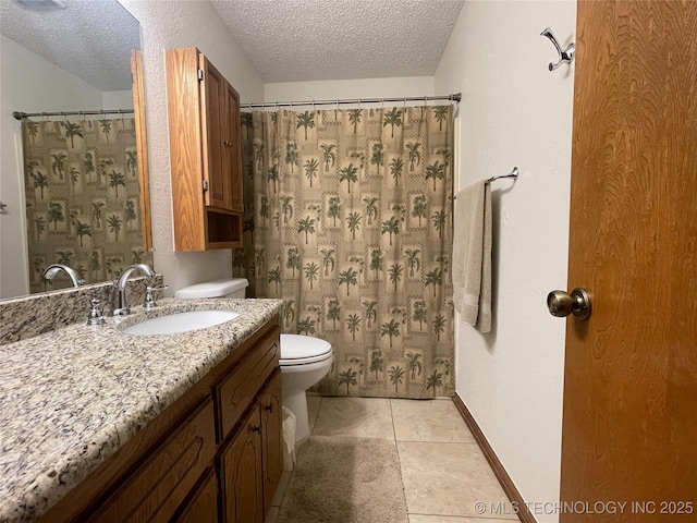 full bathroom featuring tile patterned floors, a textured ceiling, vanity, and toilet