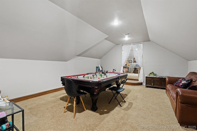 recreation room with visible vents, carpet, baseboards, and vaulted ceiling