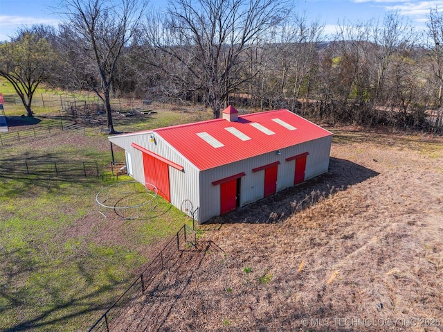 drone / aerial view with a view of trees