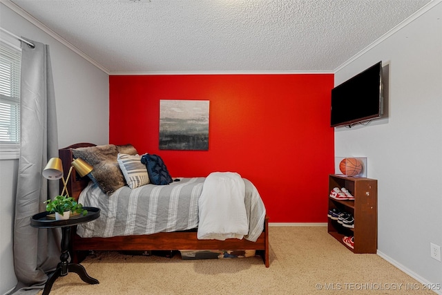 bedroom featuring baseboards, a textured ceiling, and ornamental molding