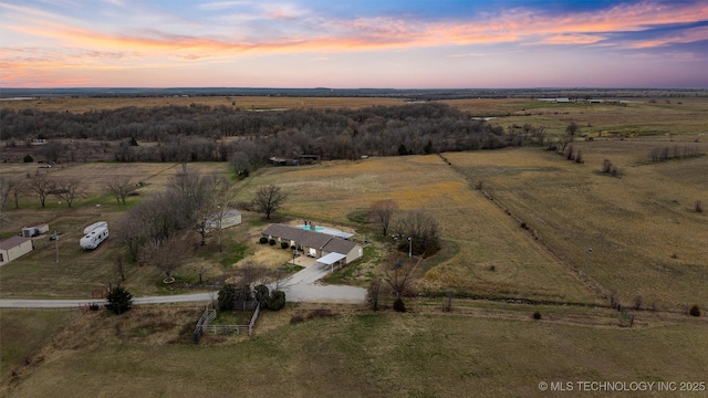 aerial view at dusk with a rural view