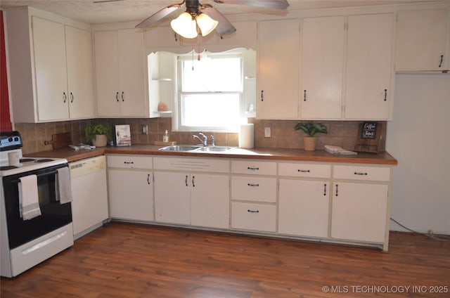 kitchen with tasteful backsplash, white appliances, a ceiling fan, and a sink