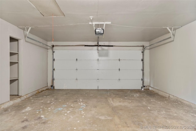 garage featuring a garage door opener