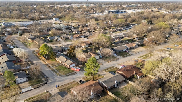 birds eye view of property with a residential view