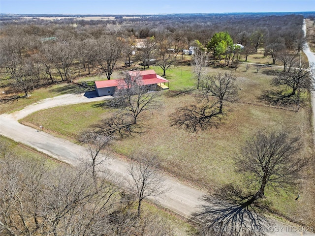 birds eye view of property with a rural view